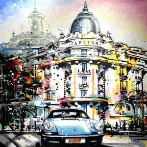 Two lovers in a Porsche 911, in front of the Carton hotel in Cannes